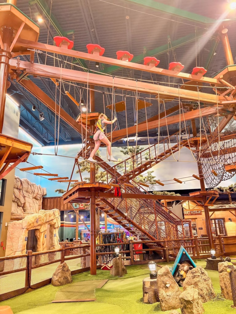 Kids on the indoor ropes course at Great Wolf Lodge.