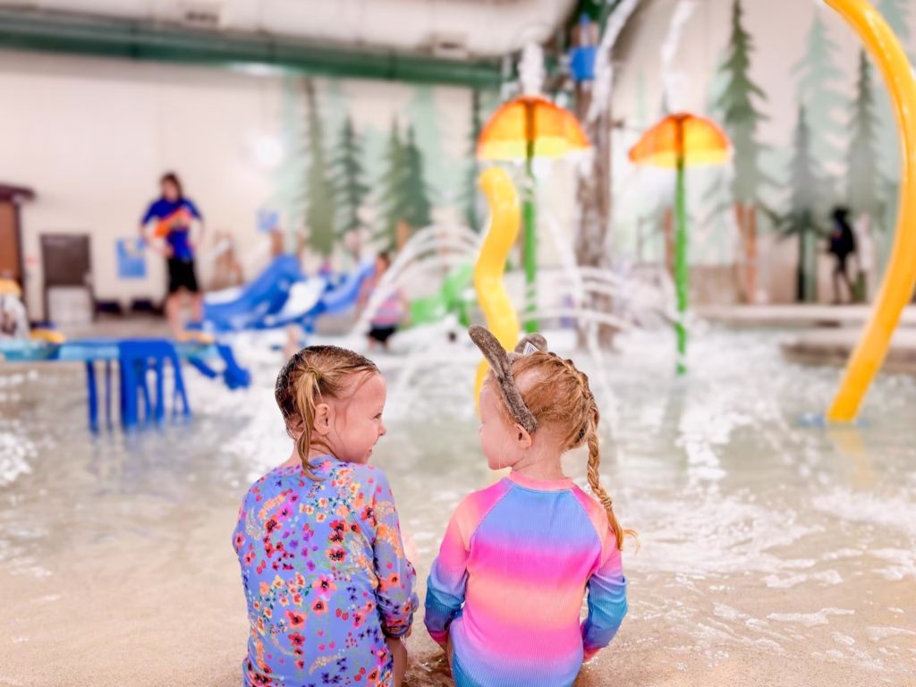 Kids going to pay at the indoor water park at Great Wolf Lodge.
